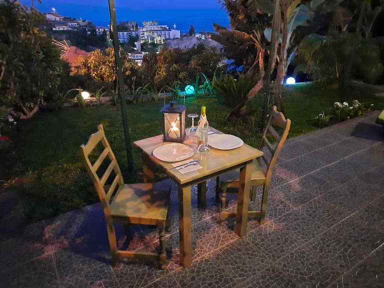 The garden apartment outdoor dining at night