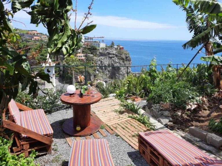 The garden apartment garden view with sun loungers