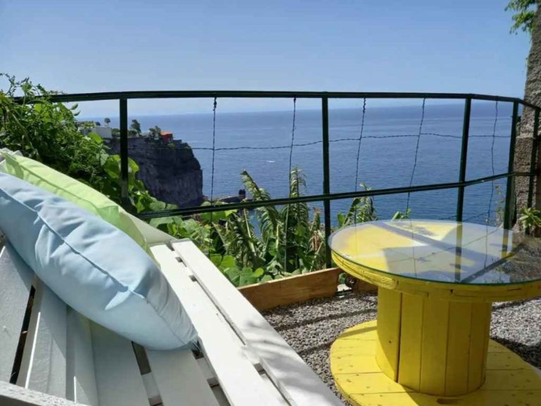 The banana tree apartment outdoor table and chair with a view